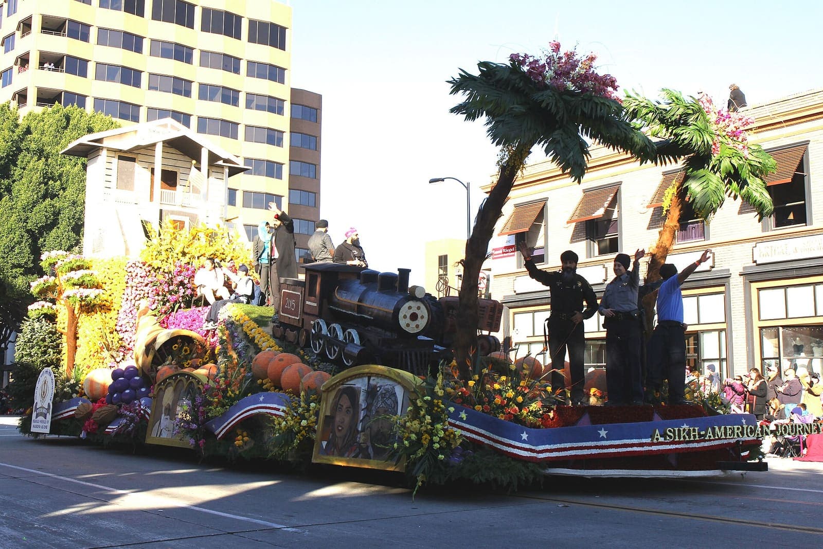 A Sikh-American float with flowers and a locomotive at the Rose Parade in Pasadena